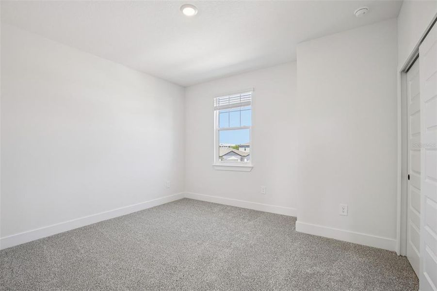 Spacious, unfurnished interior of a new home in Magnolia Bay - Reserve Series, Nokomis (Image 26).