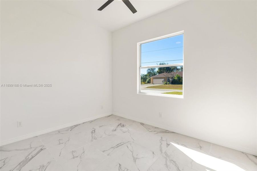 Spacious, unfurnished interior of a new home in , Lehigh Acres (Image 8).