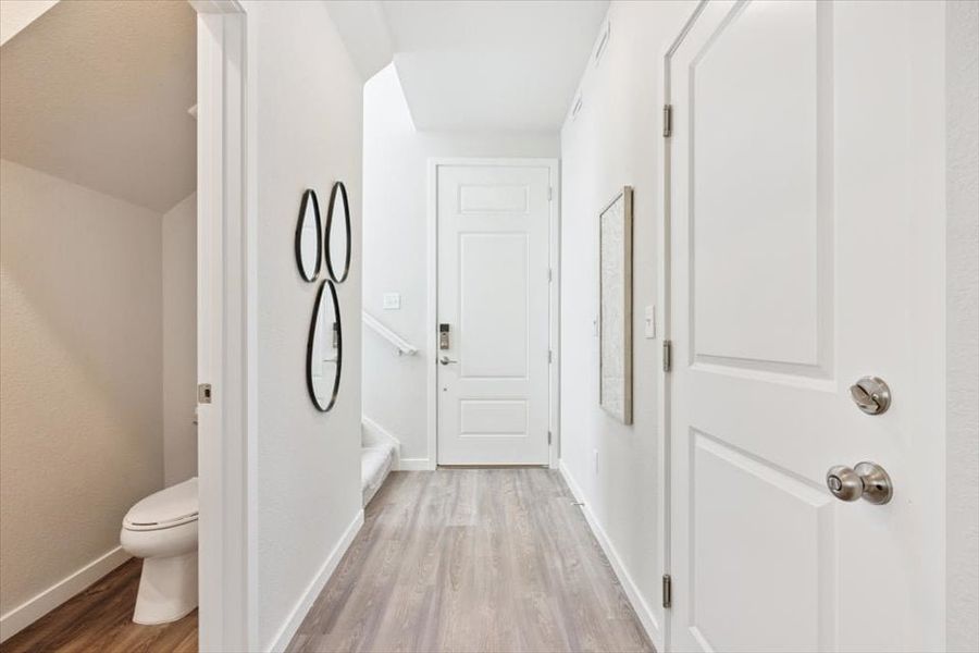 A bathroom with white doors. A bathroom with white doors.