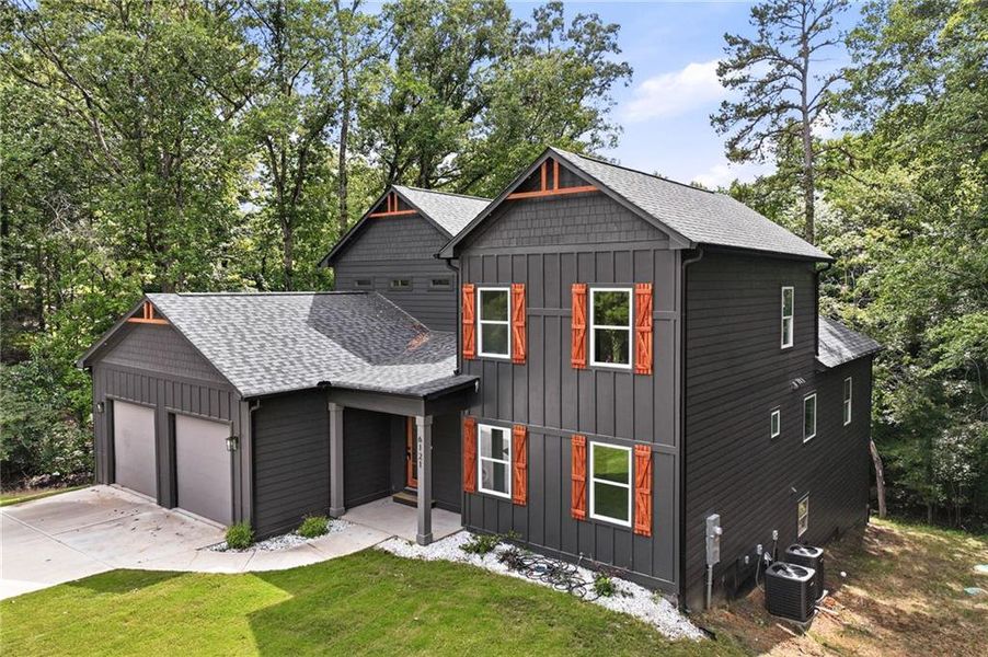 Front exterior of a new home in , Gainesville, GA, highlighting curb appeal (Image 2). Front exterior of a new home in , Gainesville, GA, highlighting curb appeal (Image 2).