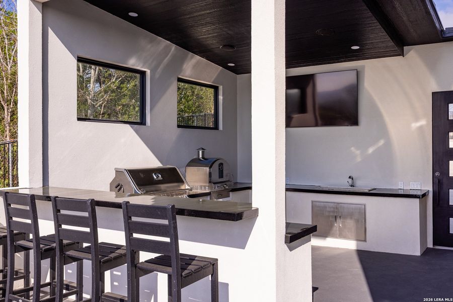 Exterior details and patio area of a home in , Kerrville (Image 47).