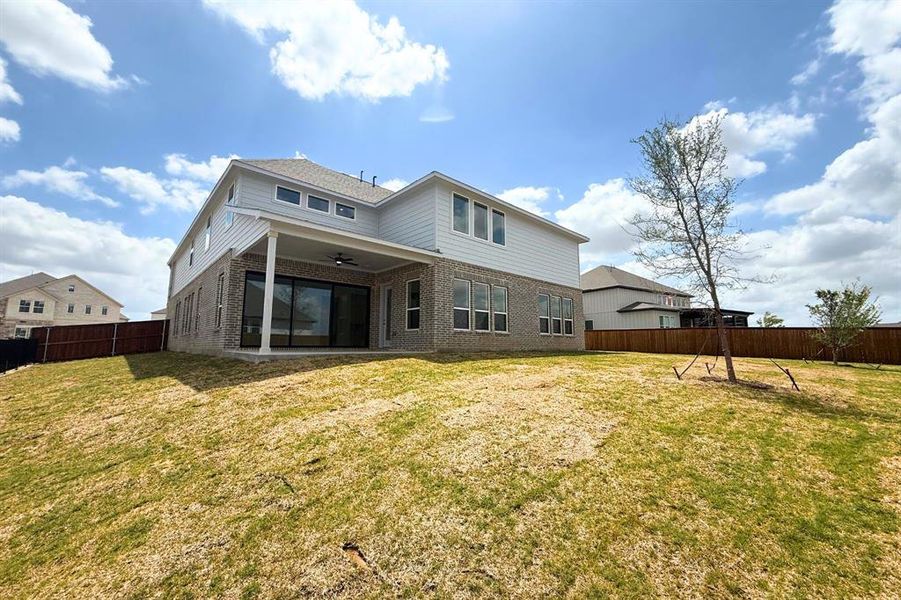 Exterior details and patio area of a home in Sweetgrass, Haslet (Image 3).