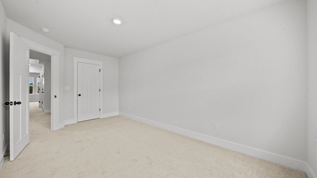 Memorable space offering plush carpet underfoot and a thoughtfully planned walk-in closet