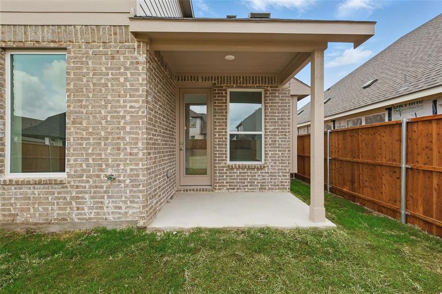 Exterior details and patio area of a home in Wildflower Ranch, Justin (Image 3). Exterior details and patio area of a home in Wildflower Ranch, Justin (Image 3).