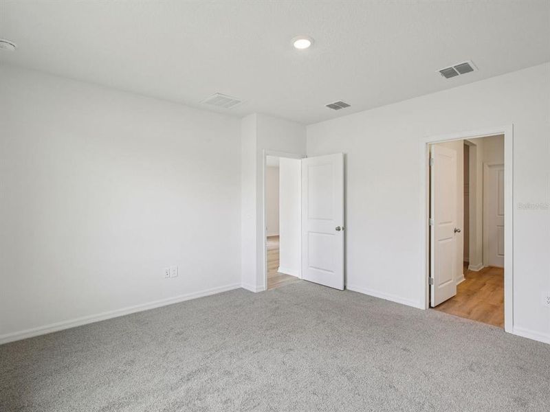 Spacious, unfurnished interior of a new home in Magnolia Bay - Premier Series, Nokomis (Image 13).