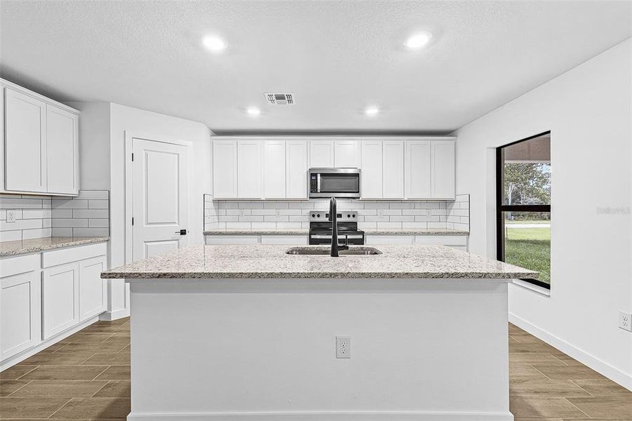 Furnished interior view inside a new home in , North Port (Image 9). Furnished interior view inside a new home in , North Port (Image 9).