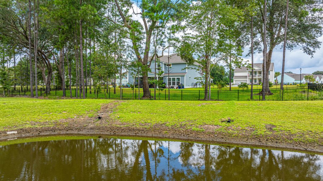 Front exterior of a new home in Sea Island Preserve, Johns Island, SC, highlighting curb appeal (Image 21).
