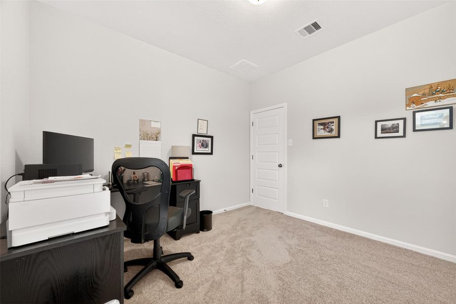 Furnished interior view inside a new home in Mill Creek Trails, Magnolia (Image 36).