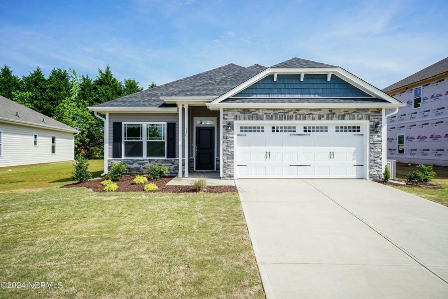 Front exterior of a home in the Waverly Place community, located in Richlands, NC (Image 16).