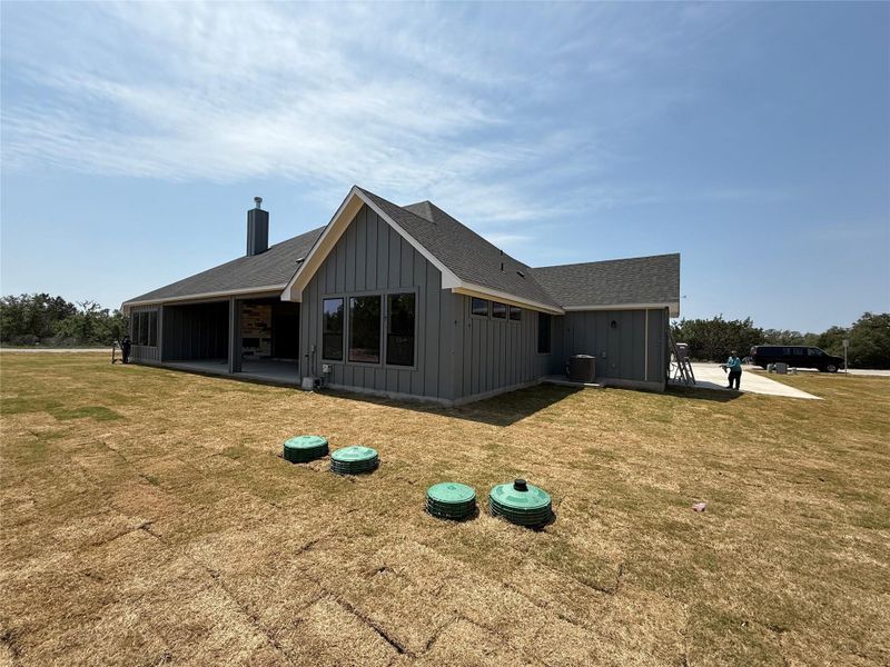 Back of Home - Situated on a 1 acre lot with 25' of landscaping and irrigation in the rear yard. Back of Home - Situated on a 1 acre lot with 25' of landscaping and irrigation in the rear yard.