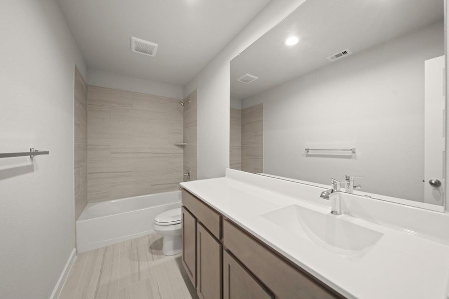 Furnished interior view inside a new home in Barton Creek Ranch, Conroe (Image 7). Furnished interior view inside a new home in Barton Creek Ranch, Conroe (Image 7).