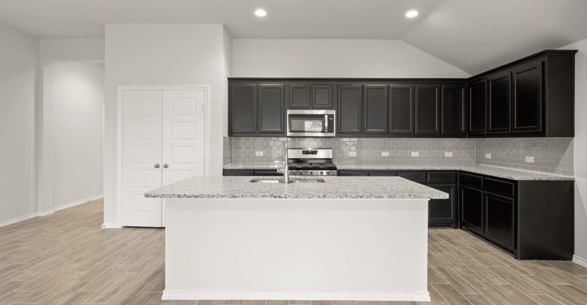 Representative exterior photo of a completed home built from the Boston by Impression Homes in Baker Farms, Cleburne, TX (Image 2).