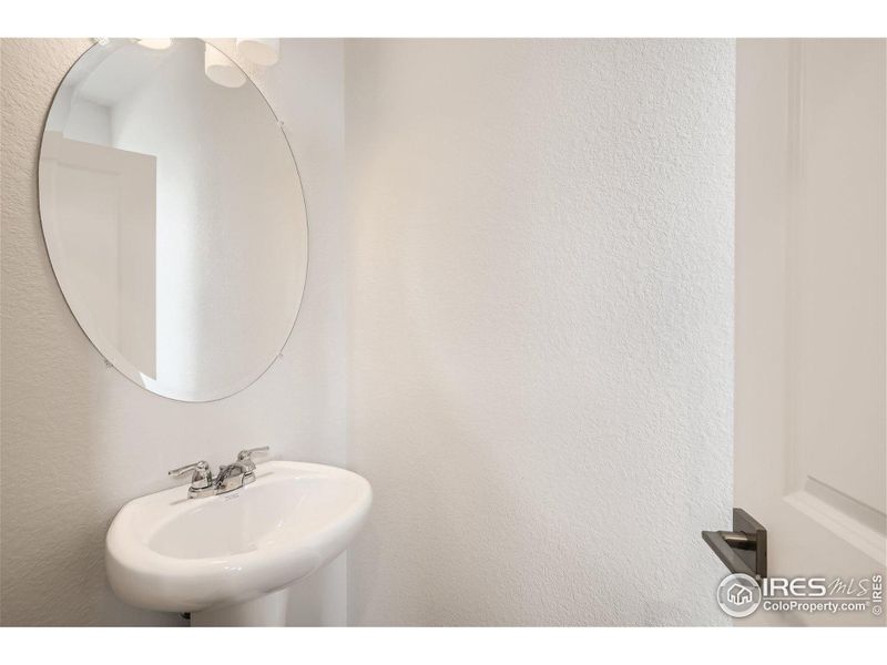 Main level bathroom - Same Floor Plan, Different Model.