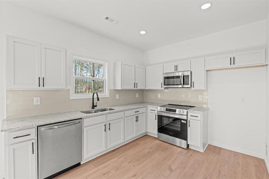 Furnished interior view inside a new home in , Carrollton (Image 5).