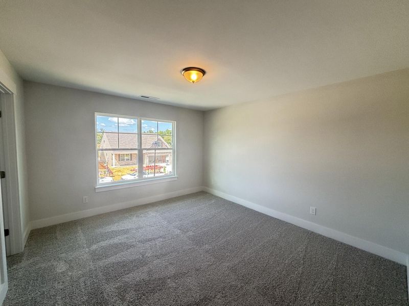 Spacious, unfurnished interior of a new home in Daniel Farms, Benson (Image 28).