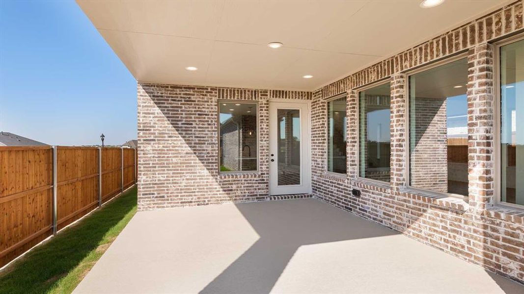 Exterior details and patio area of a home in The Heights At Uptown Celina 45', Celina (Image 2). Exterior details and patio area of a home in The Heights At Uptown Celina 45', Celina (Image 2).