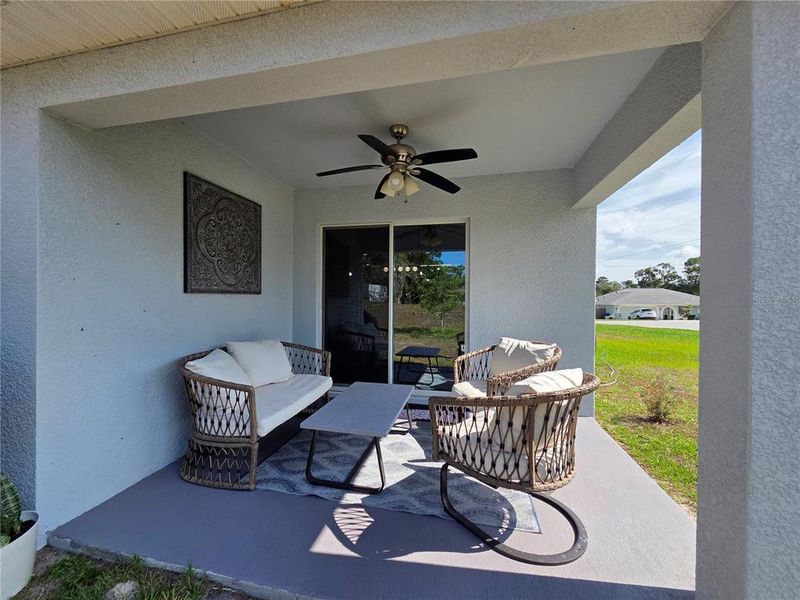 Exterior details and patio area of a home in Hernando County Spot Lots, Spring Hill (Image 4).