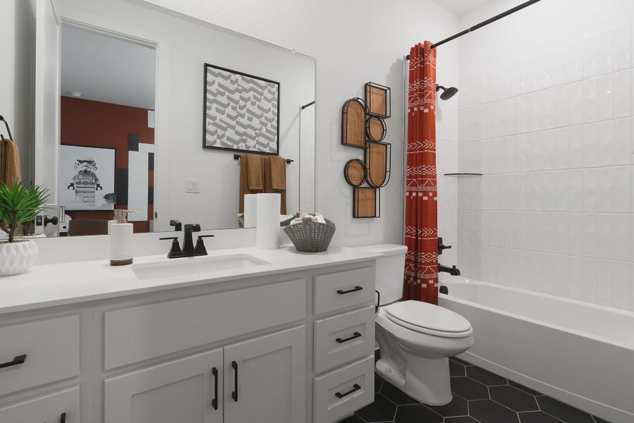 Representative furnished interior of a home built from the Barron by Chesmar Homes in Lariat, Liberty Hill (Image 32).