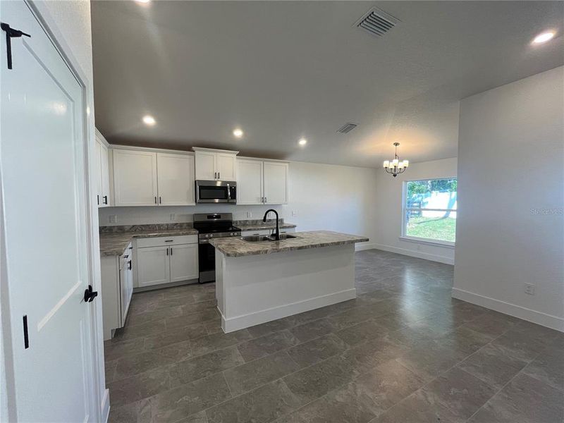 Furnished interior view inside a new home in Orange Blossom Hills, Summerfield (Image 8).