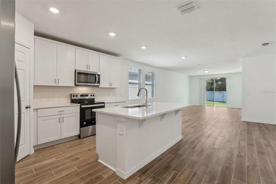 Furnished interior view inside a new home in Lawson Dunes - Signature Series, Haines City (Image 14).