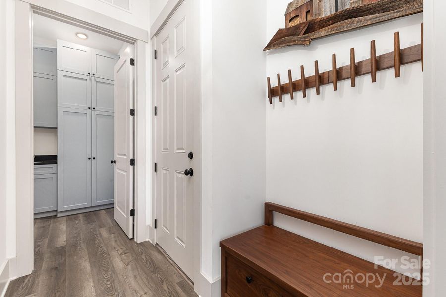 Drop zone and laundry with wonderful storage cabinets Drop zone and laundry with wonderful storage cabinets