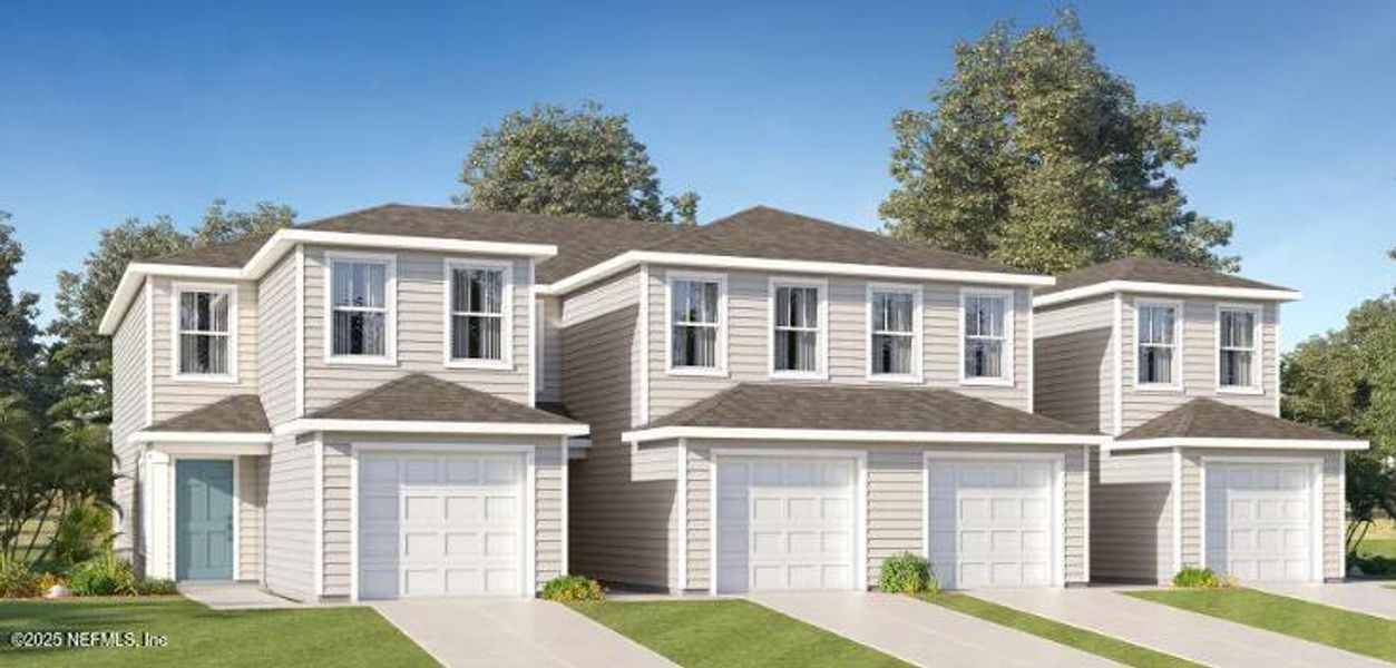 Front exterior of a new home in Oak Hill Village Townhomes, Jacksonville, FL, highlighting curb appeal (Image 1). Front exterior of a new home in Oak Hill Village Townhomes, Jacksonville, FL, highlighting curb appeal (Image 1).