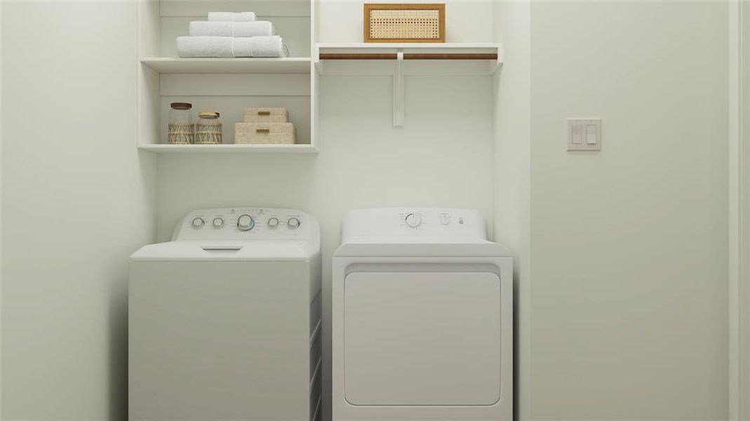 Laundry room with washing machine and clothes dryer