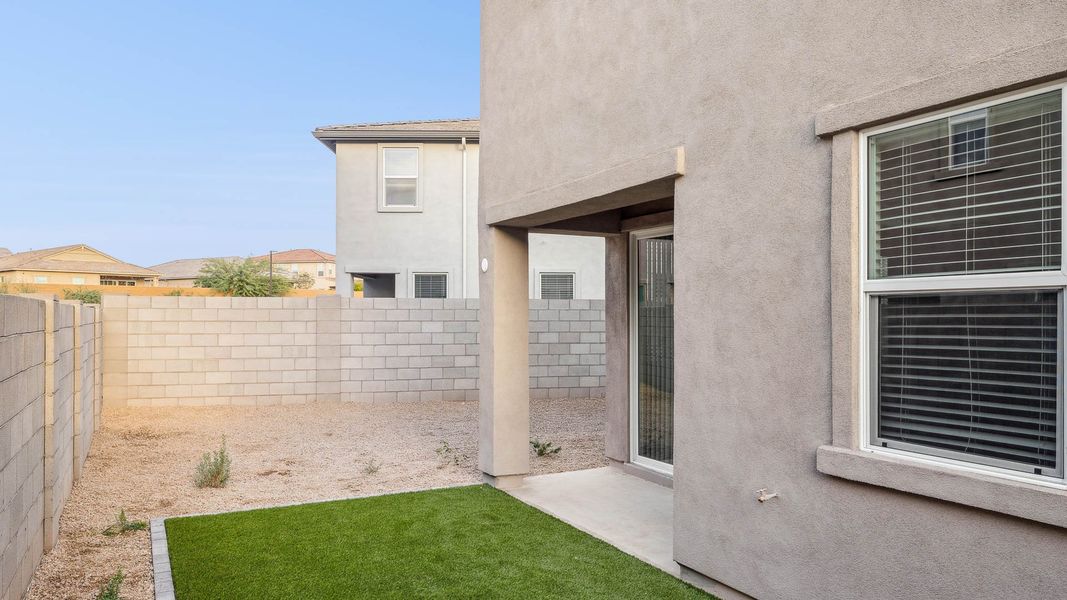 Exterior details and patio area of a home in Talinn Towns at Desert Ridge, Phoenix (Image 19).