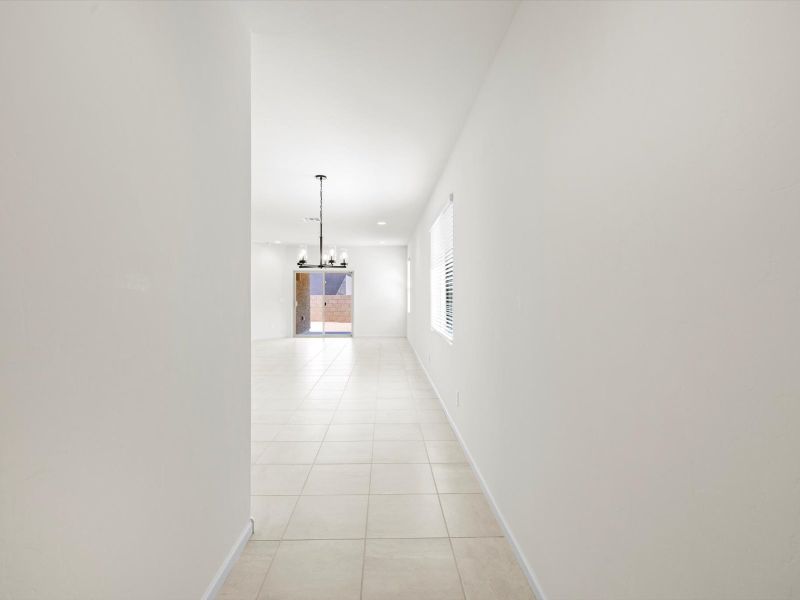 Spacious, unfurnished interior of a new home in Mandarina - Signature Series, Marana (Image 8).