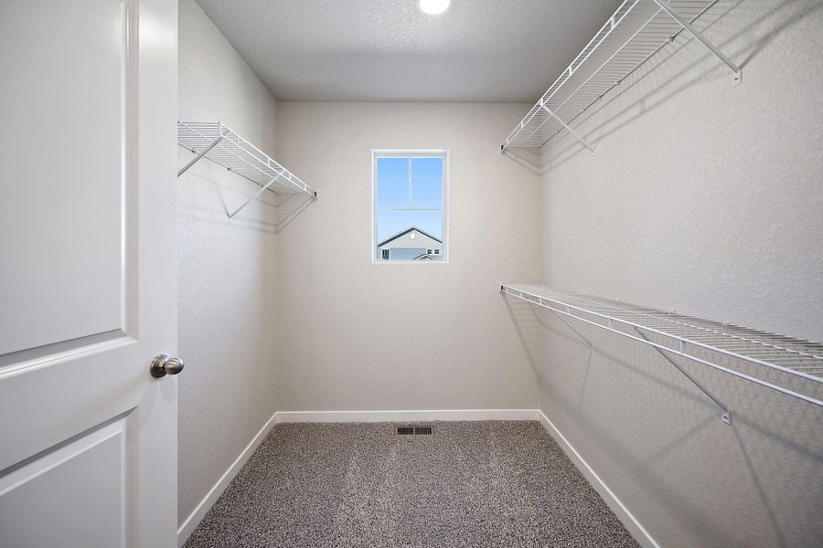 Spacious, unfurnished interior of a new home in Ridge at Lorson Ranch, Colorado Springs (Image 27).