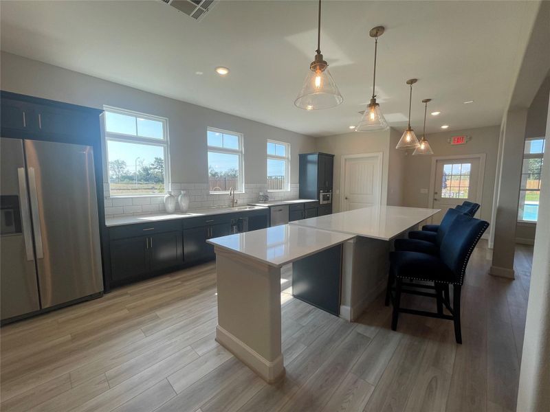 Spacious, beautifully appointed clubhouse kitchen at Winfrey Estates – perfect for hosting gatherings, cooking classes, or community events, with plenty of counter space for entertaining.