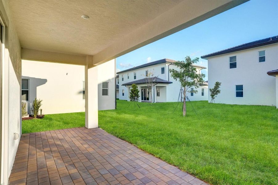 Covered patio leading to pool