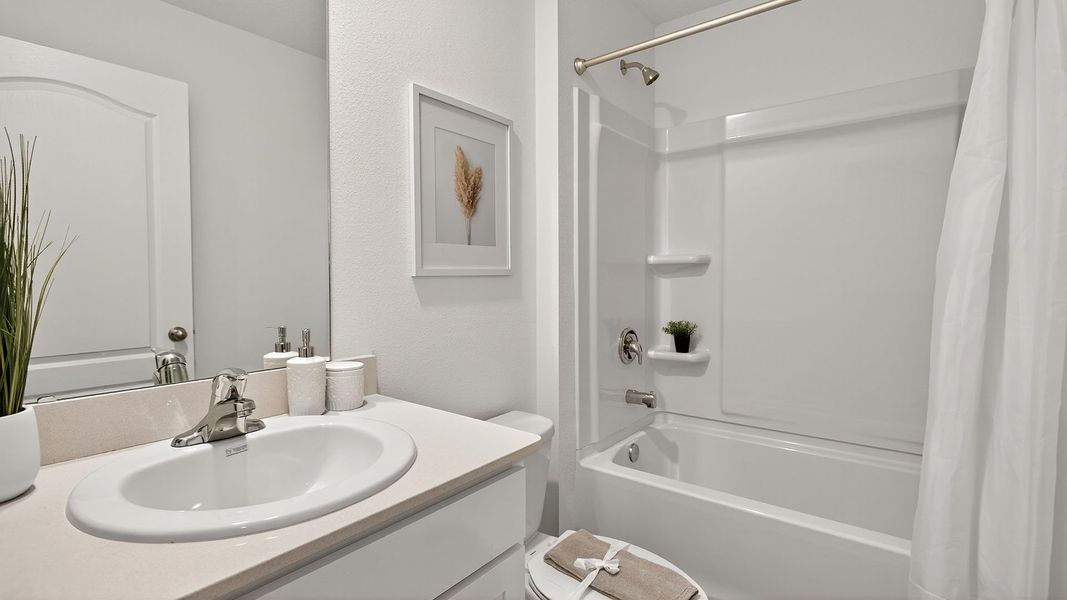 Representative furnished interior of a home built from the CARSON by D.R. Horton in Trout River, Jacksonville (Image 16).