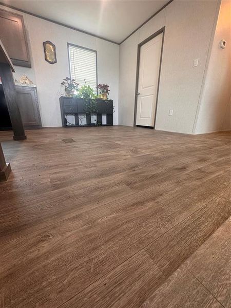 Dining area featuring dark wood-style floors Dining area featuring dark wood-style floors