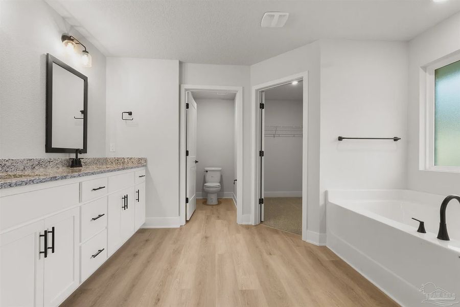 Furnished interior view inside a new home in Pecan Valley, Cantonment (Image 6).