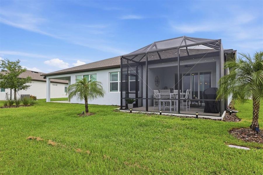 Exterior details and patio area of a home in , Parrish (Image 23).