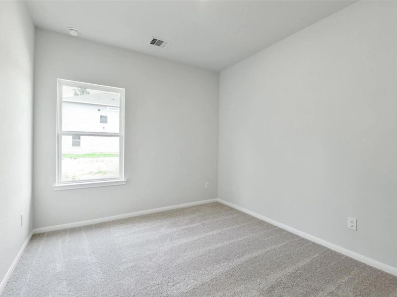 Spacious, unfurnished interior of a new home in Caney Creek Place, Conroe (Image 27).