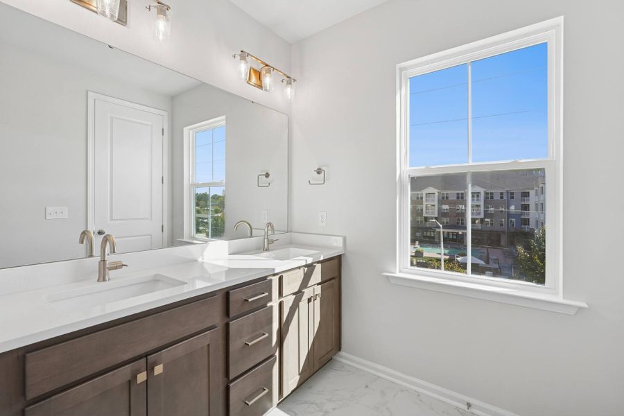 Representative furnished interior of a home built from the Nola by Tri Pointe Homes in Twinleaf Townes, Chapel Hill (Image 9).