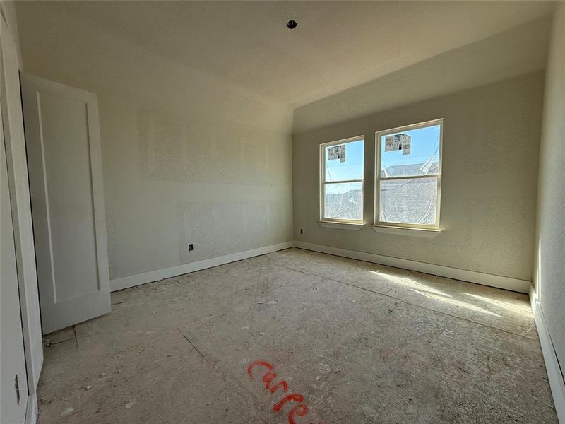 Unfurnished room with baseboards