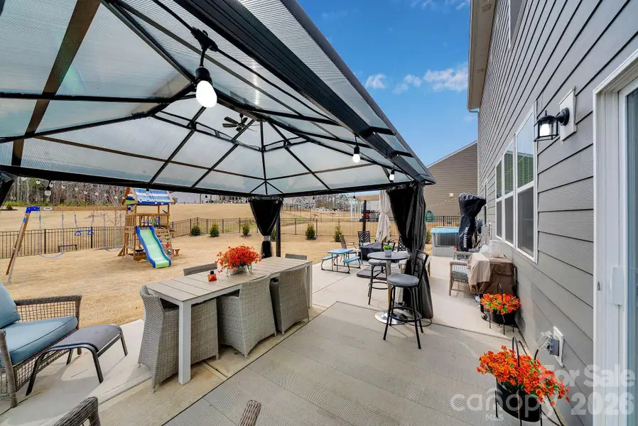 Exterior details and patio area of a home in Falls Cove at Lake Norman, Troutman (Image 3).