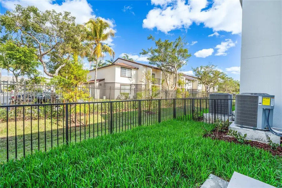 Exterior details and patio area of a home in , Pembroke Park (Image 12).
