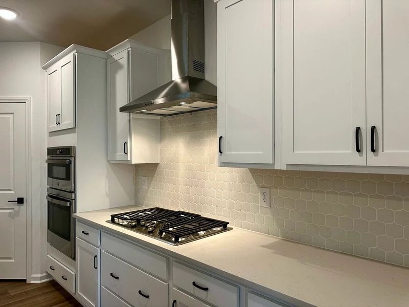 Kitchen featuring the AW Collection® Harmony - Smooth finishes and classic touches shine. Kitchen featuring the AW Collection® Harmony - Smooth finishes and classic touches shine.