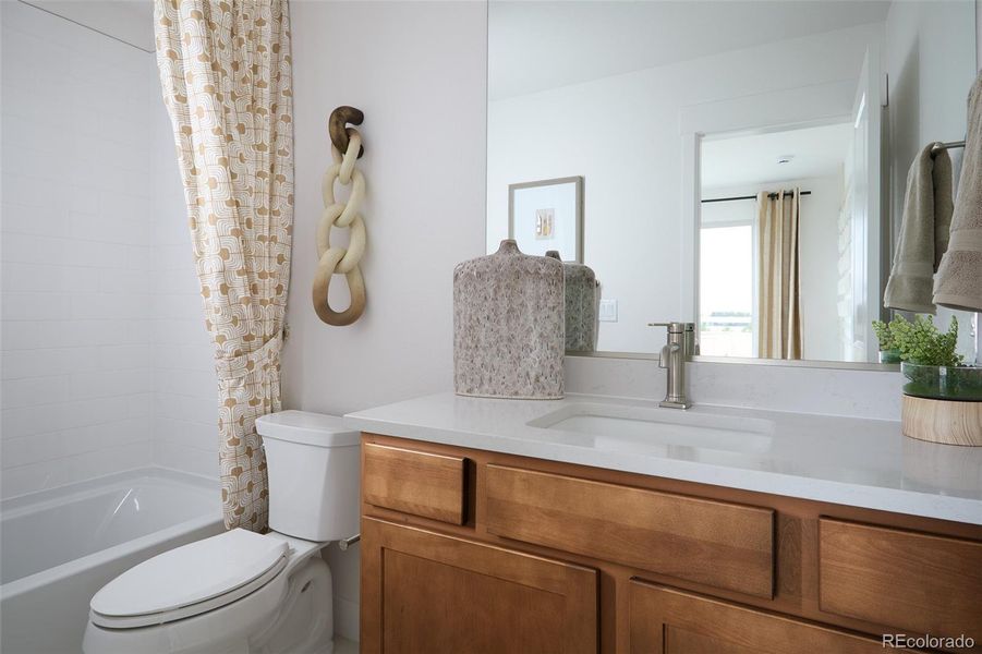 Furnished interior view inside a new home in Ascent at Inverness, Englewood (Image 16).