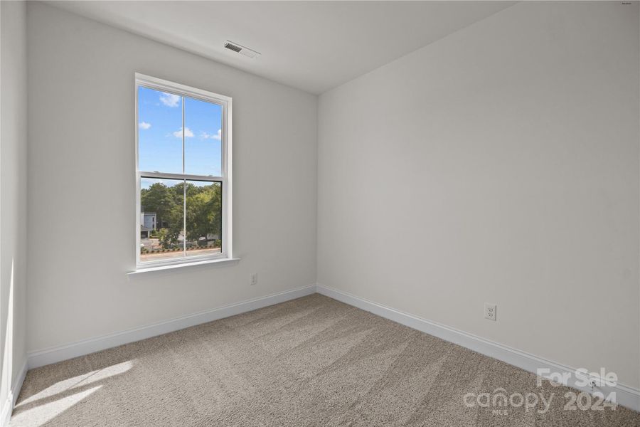 1 of 2 guest bedrooms on the 3rd level