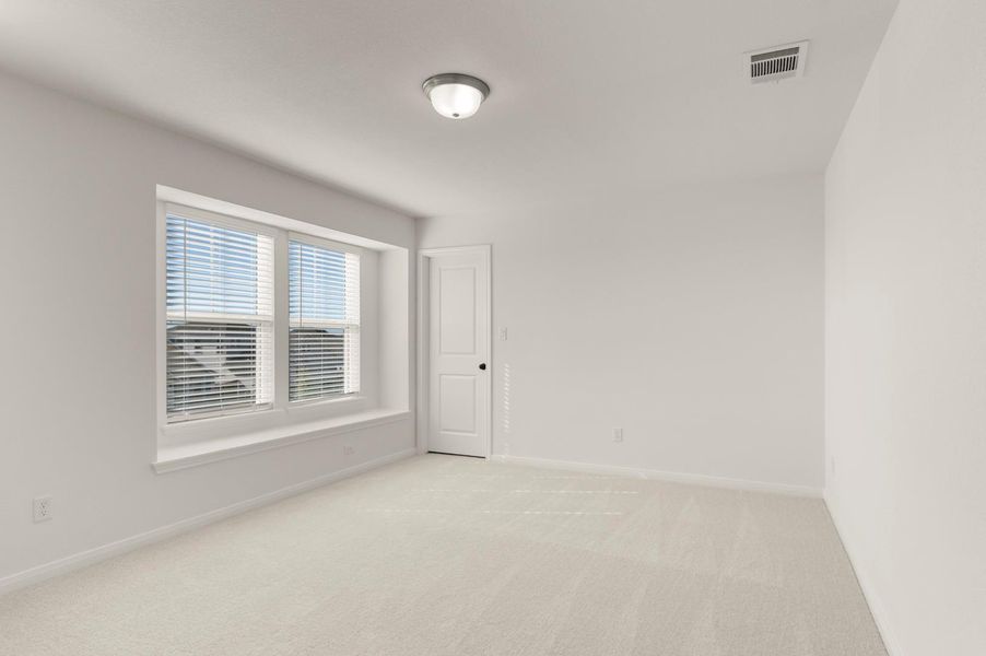 Unfurnished room featuring light carpet and baseboards Unfurnished room featuring light carpet and baseboards