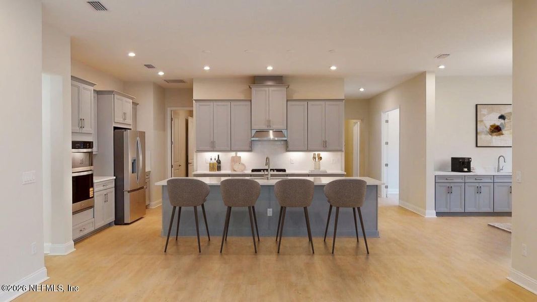 Furnished interior view inside a new home in RiverTown - WaterSong, St. Johns (Image 7).