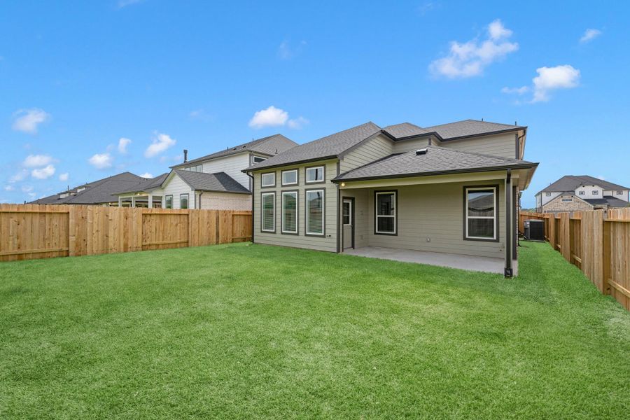 Exterior details and patio area of a home in Grand Mason Crossing, Katy (Image 3).