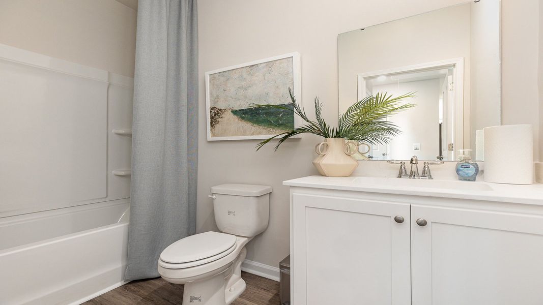 Furnished interior view inside a new home in Brunswick Plantation, Ash (Image 12).