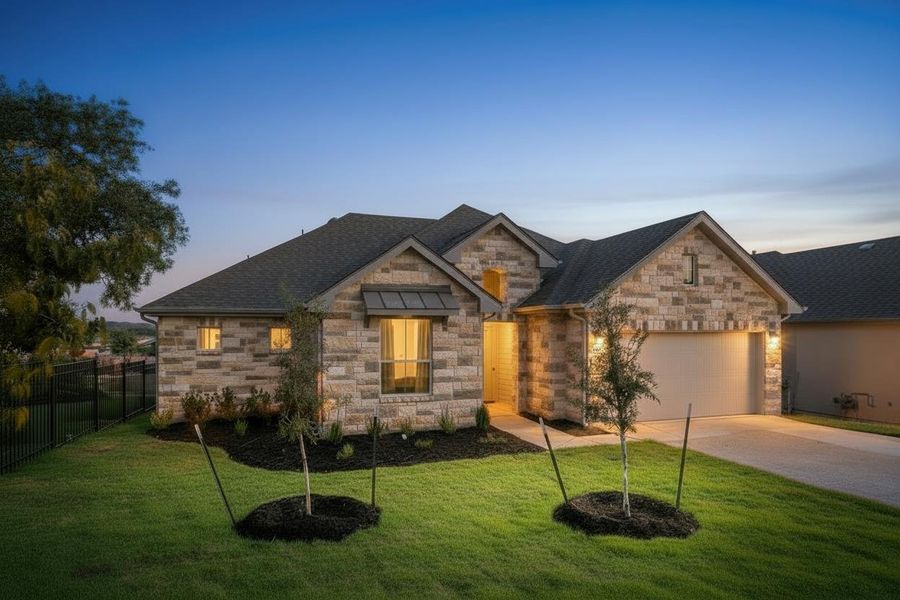 Stone exterior with a gabled roofline, an attached garage, and a concrete driveway Stone exterior with a gabled roofline, an attached garage, and a concrete driveway