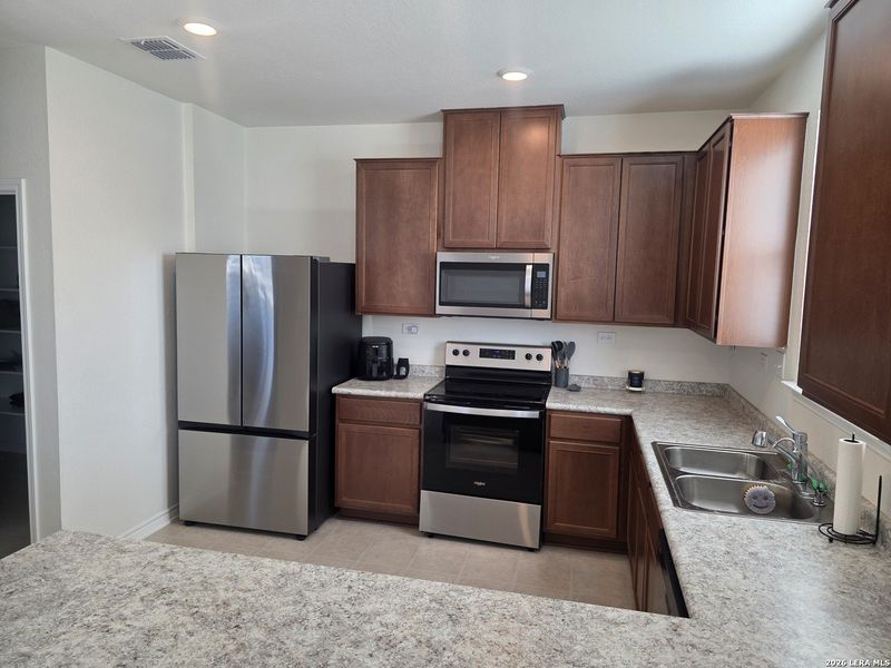 Furnished interior view inside a new home in , San Antonio (Image 6).